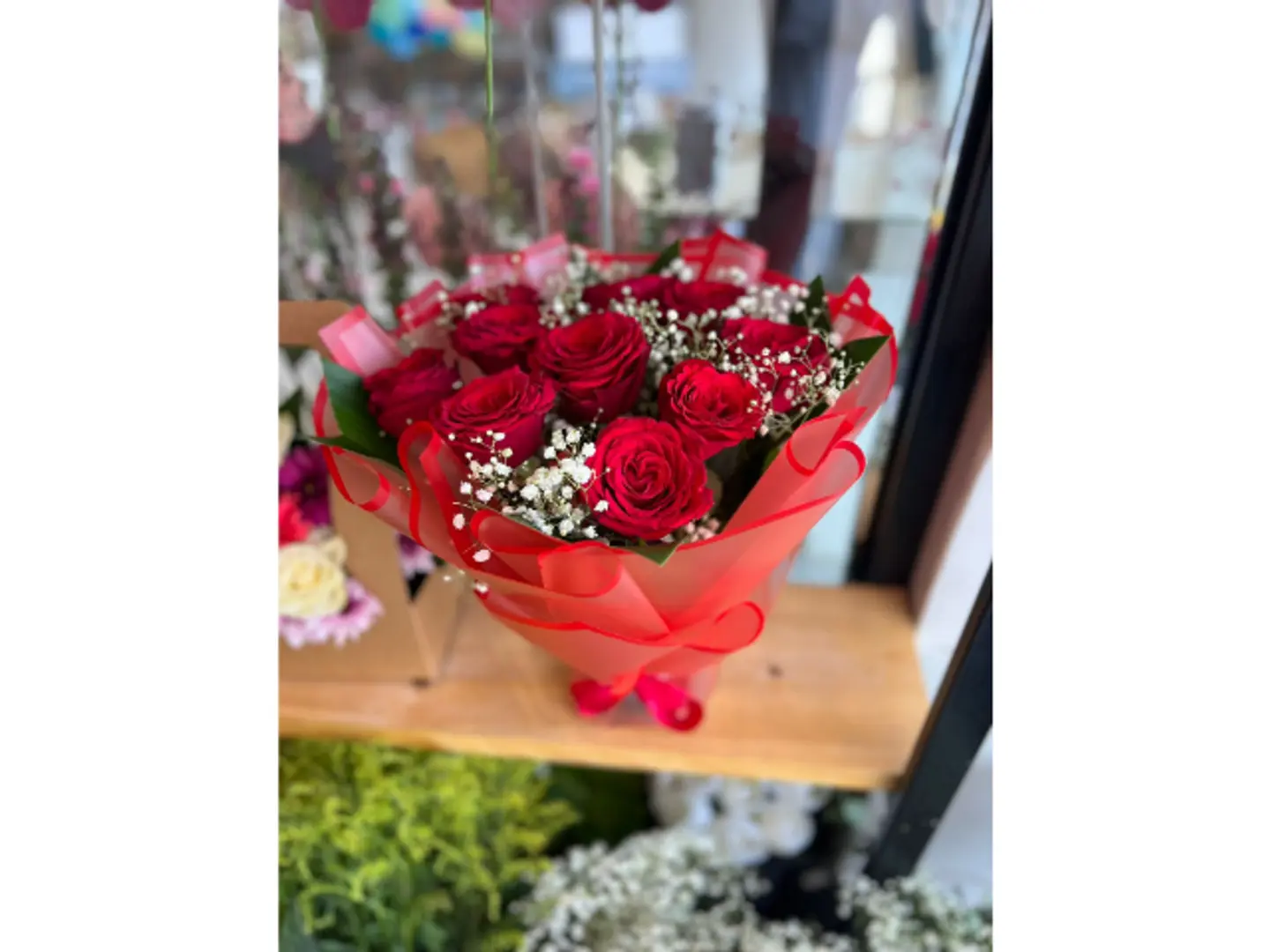 Transparent Red Bouquet With Natural Roses