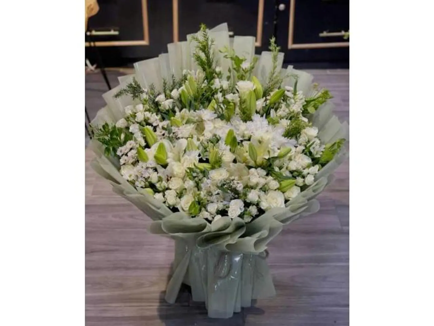 A Bouquet Of Flowers In Professional Coordination