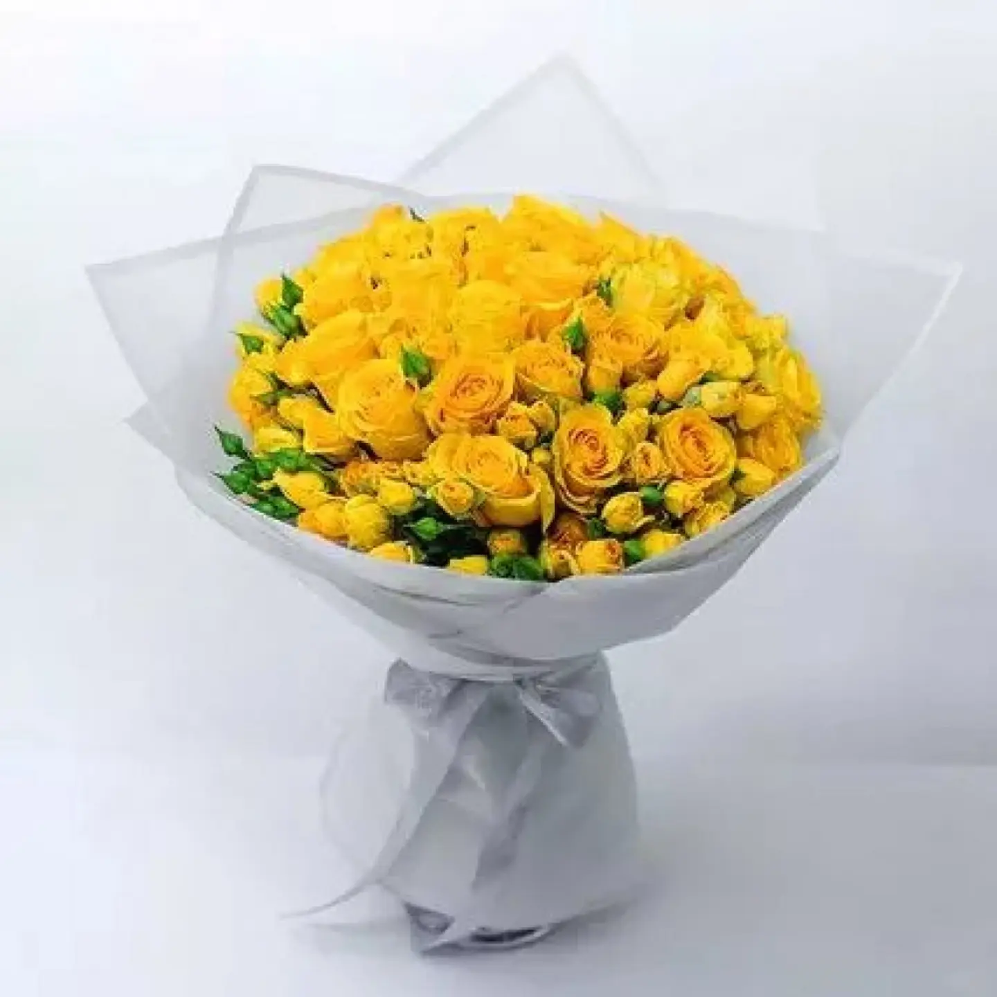 A Yellow Rose Bouquet With Roses And Baby Roses