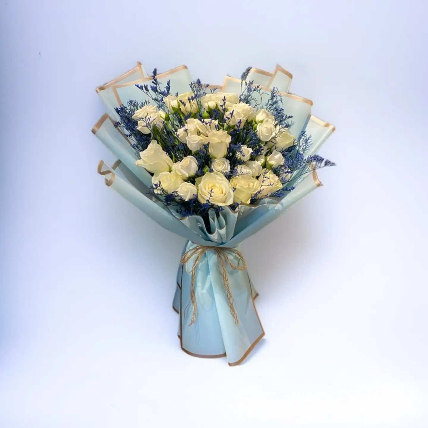 Bouquet Of White Gori Roses And Blue Statice