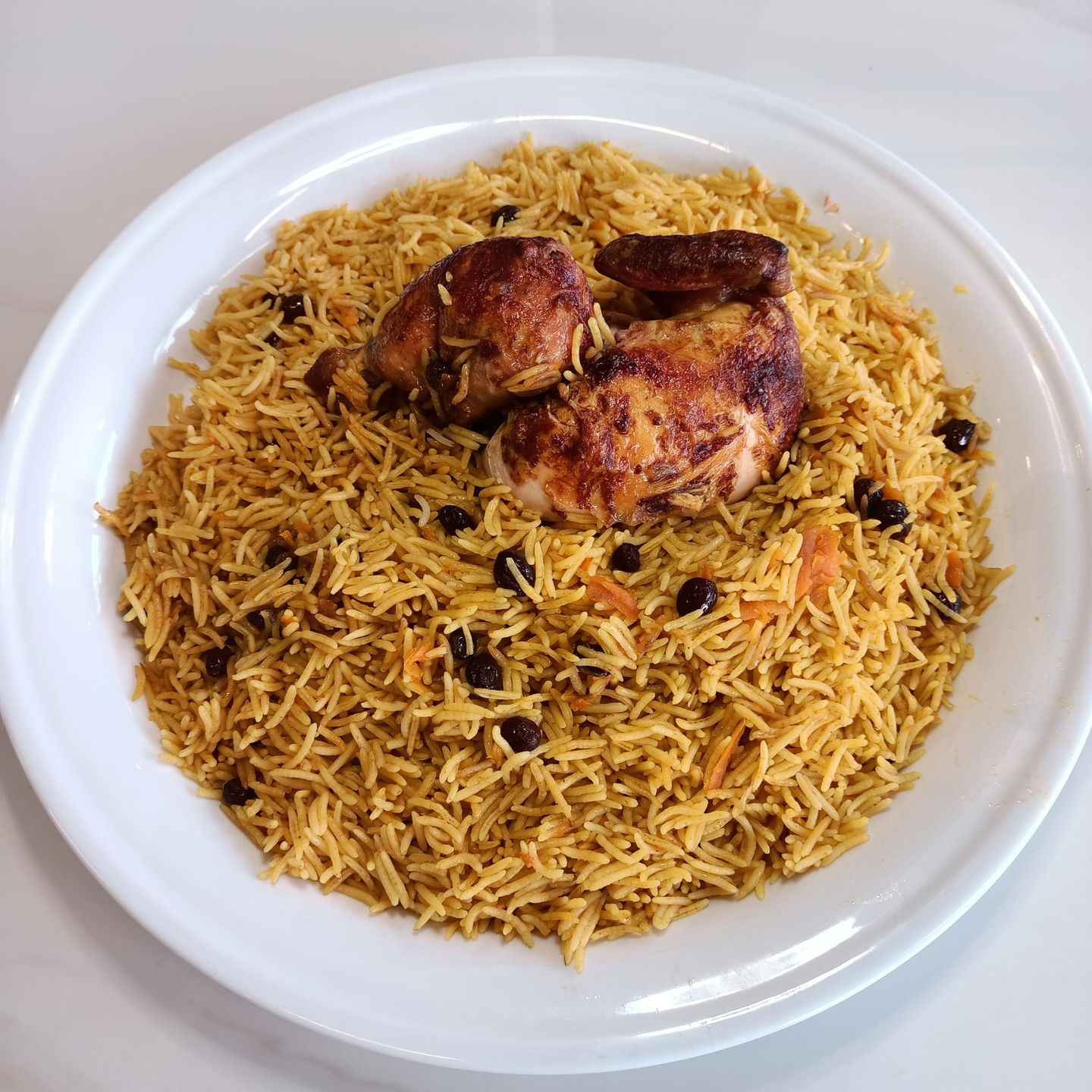 نصف دجاج شواية مع رز