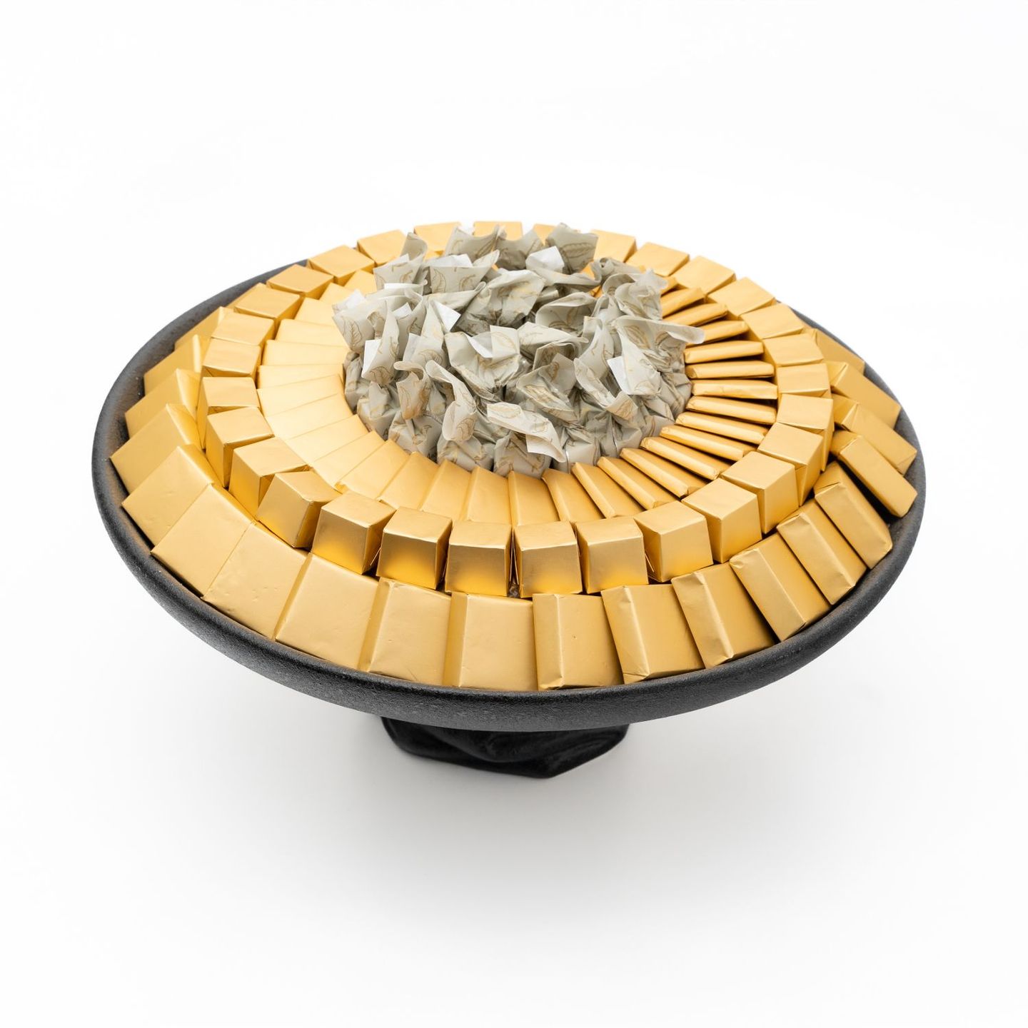 A Large Round Black Chocolate Tray