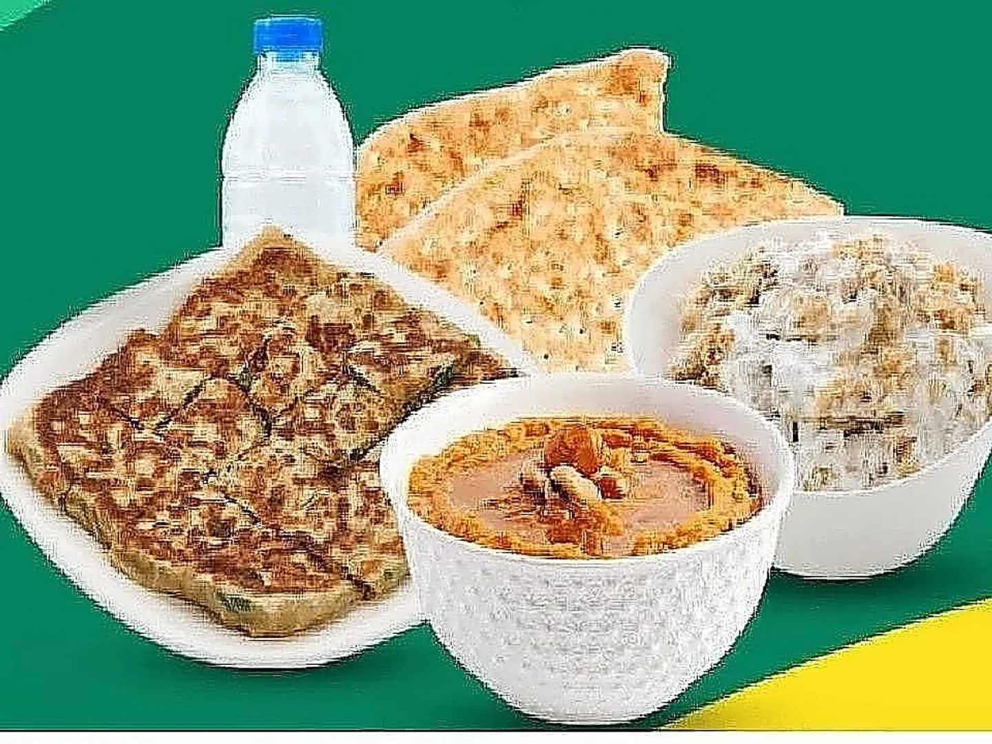 A Plate Of Ghee Qalabah With Savory Tamees And Cream Masoob