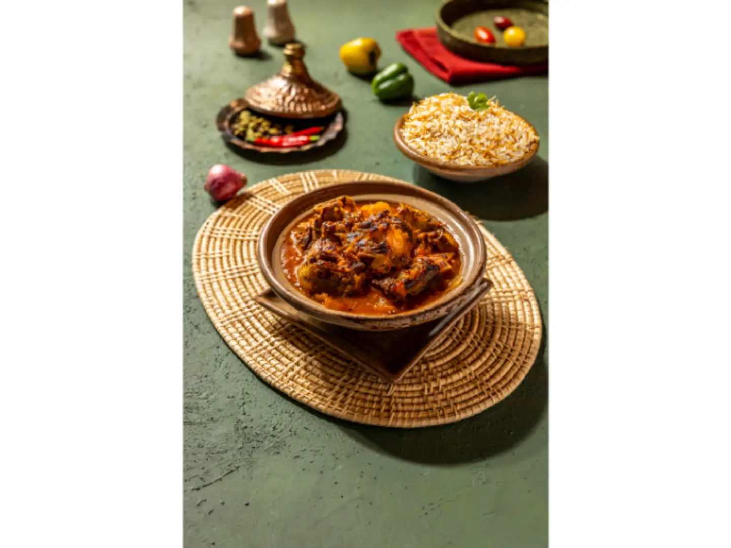 Akkaoui Tajin Served With Your Choice Of Rice