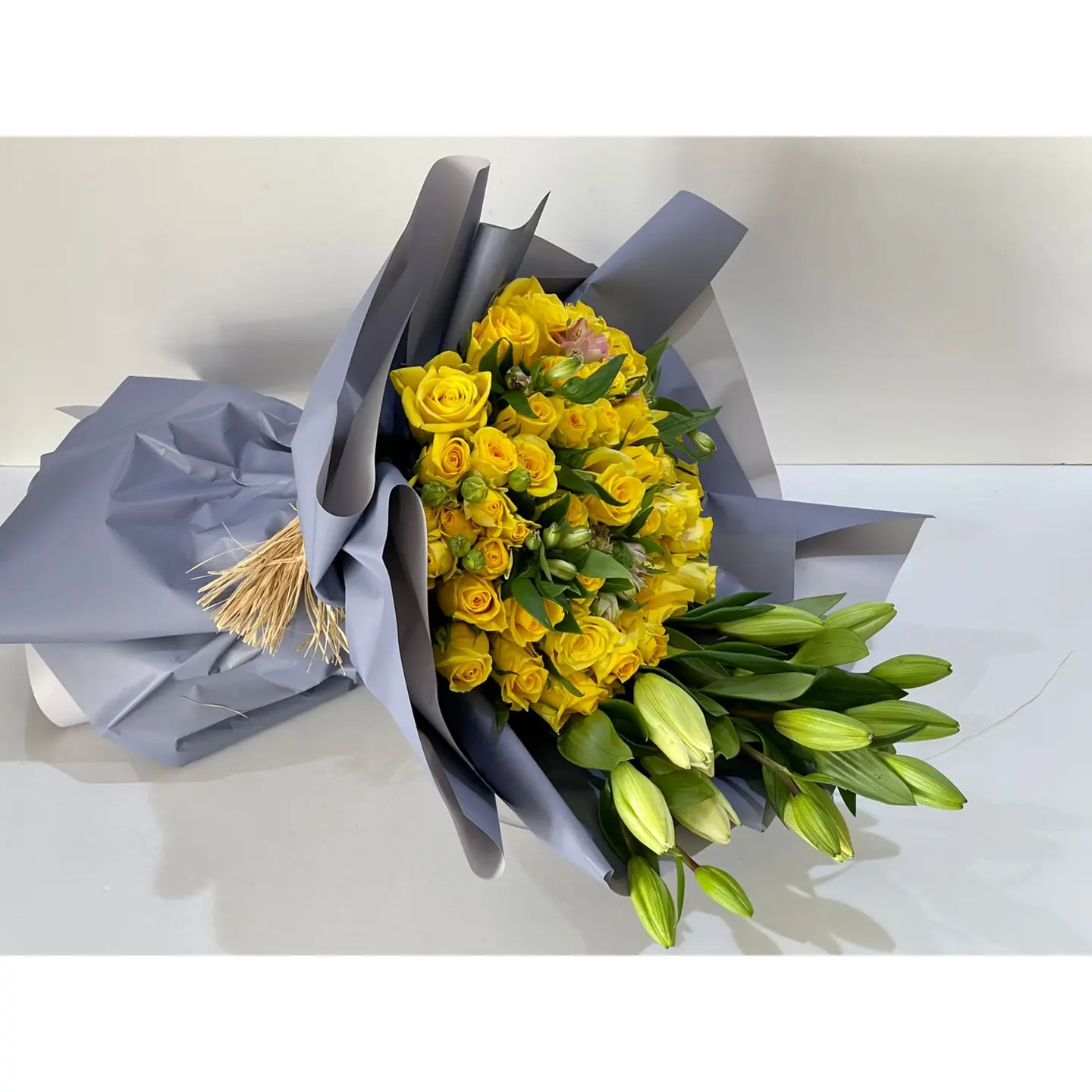 A Bouquet Of Yellow And Night Roses