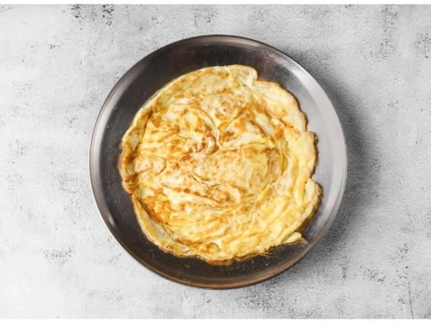 Eggs Cooked In A Clay Pan
