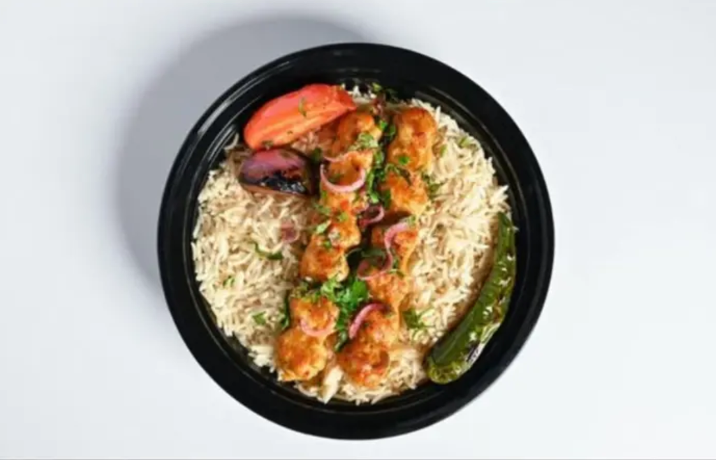 Two Skewers Of Chicken Kebab With Tagine Sauce And Hot Dakous