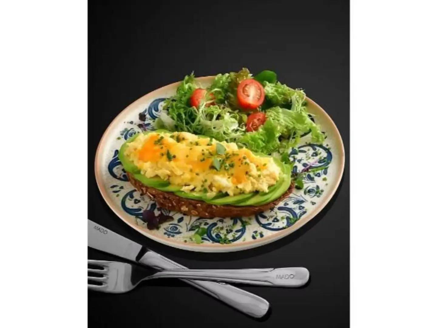 Scrambled Eggs With Cheese On Brown Bread