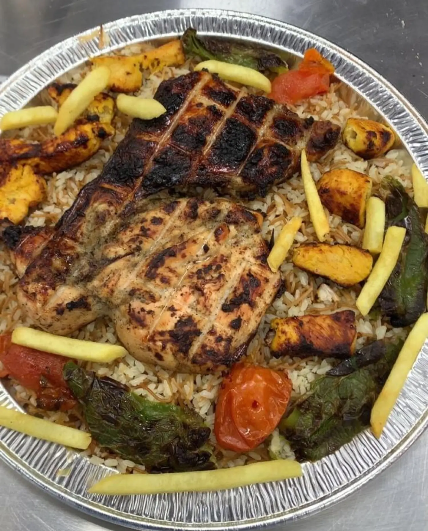 صينية بحبوح صغير نصف دجاجة بالرز