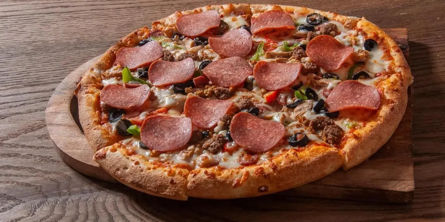 Meat Pieces And Pepperoni Pizza