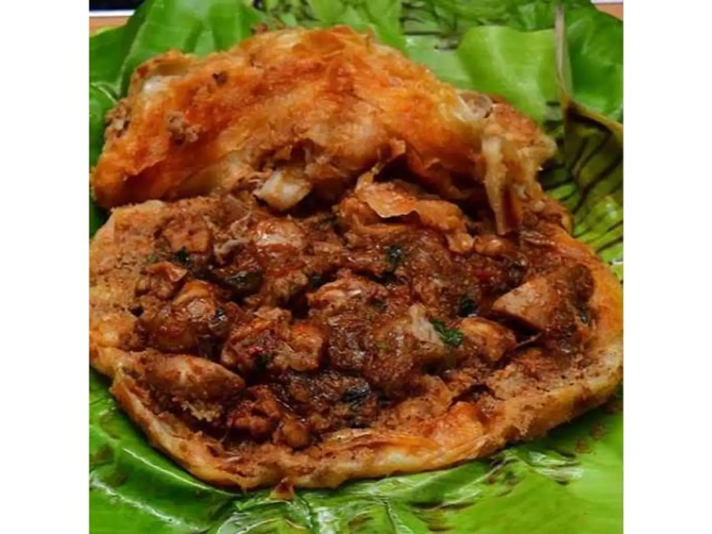 Chicken Kizhi Porotta