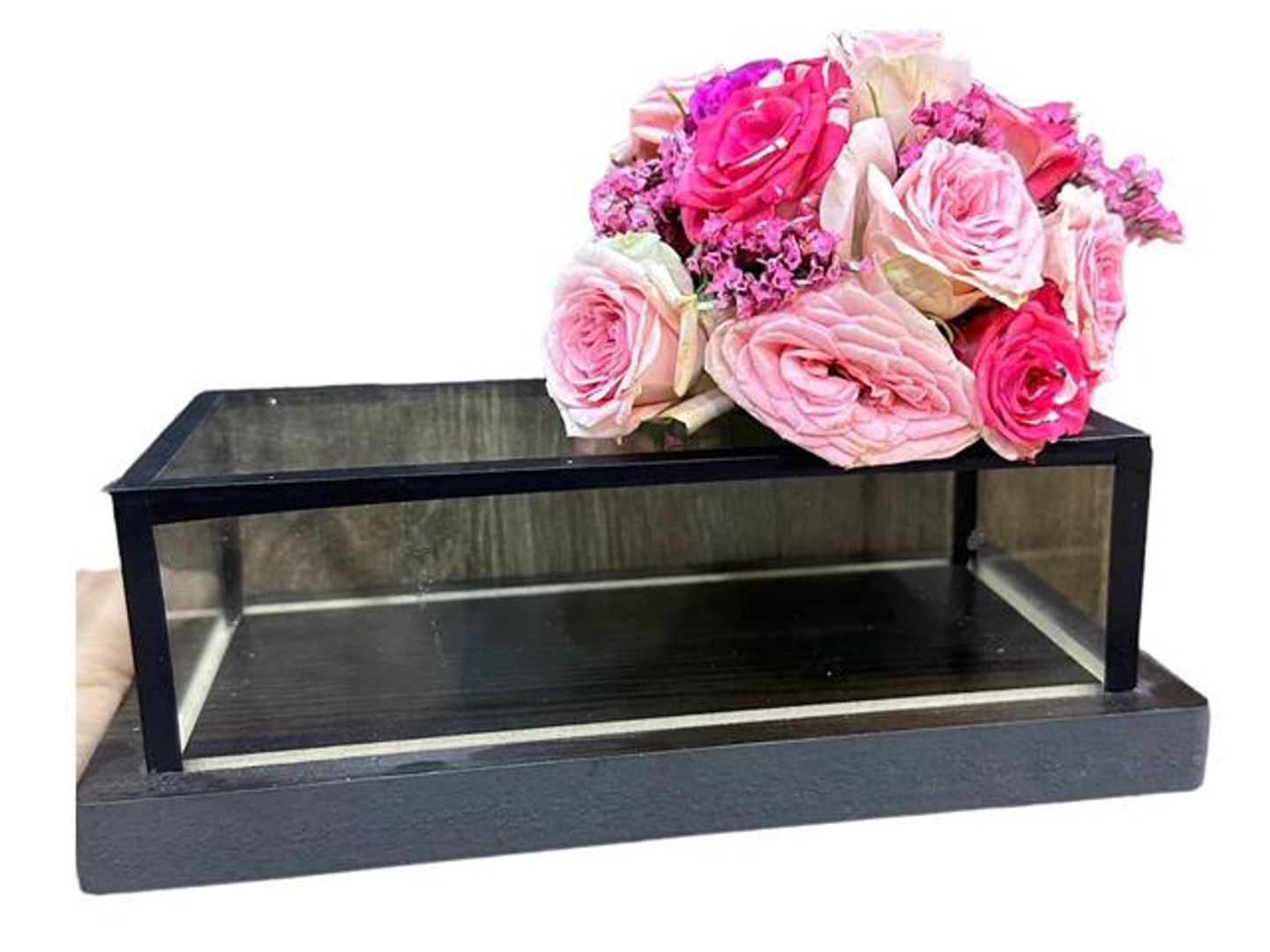 A Black Box To Present An Amount Of Money Arranged With Flowers