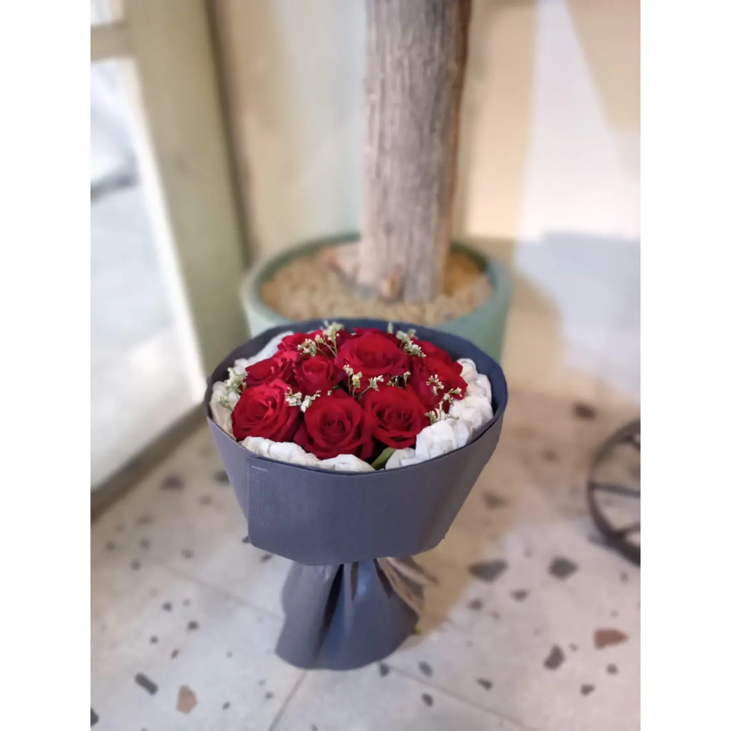 A Bouquet Of Roses With Special Packaging S34