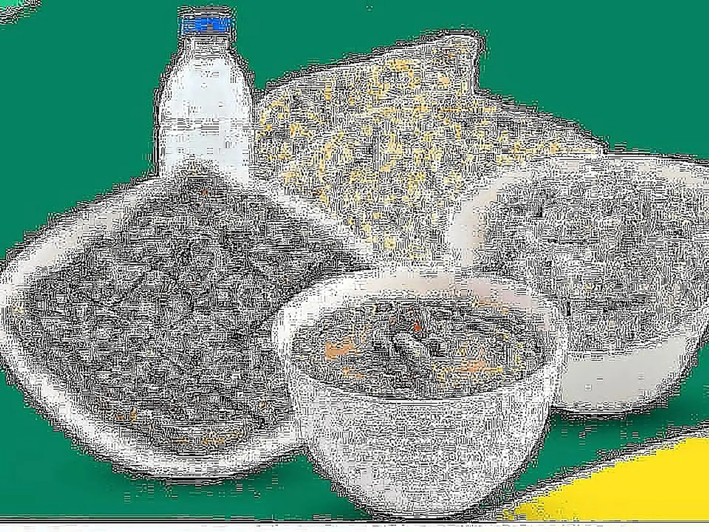 A Plate Of Ghee Qalabah With Savory Tamees And Cream Masoob