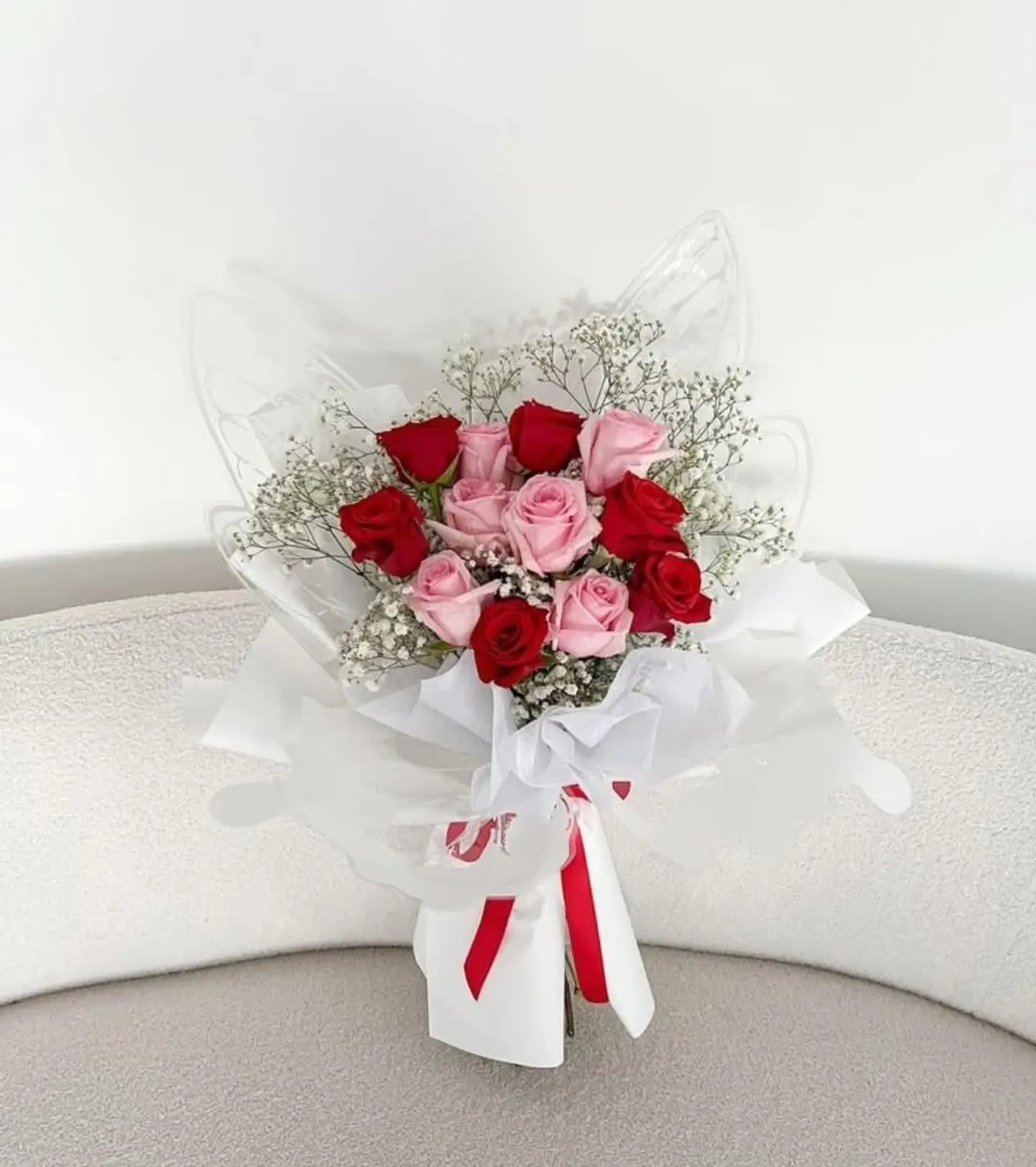 Red And Pink Bouquet With White Wrapping