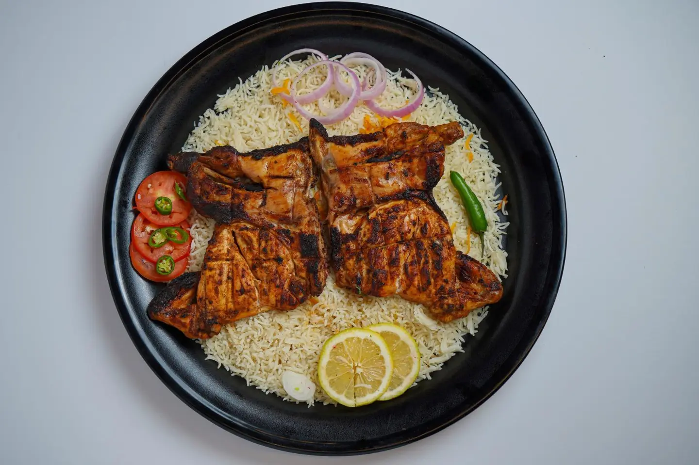 Whole Charcoal Grilled Chicken Served With White Rice.