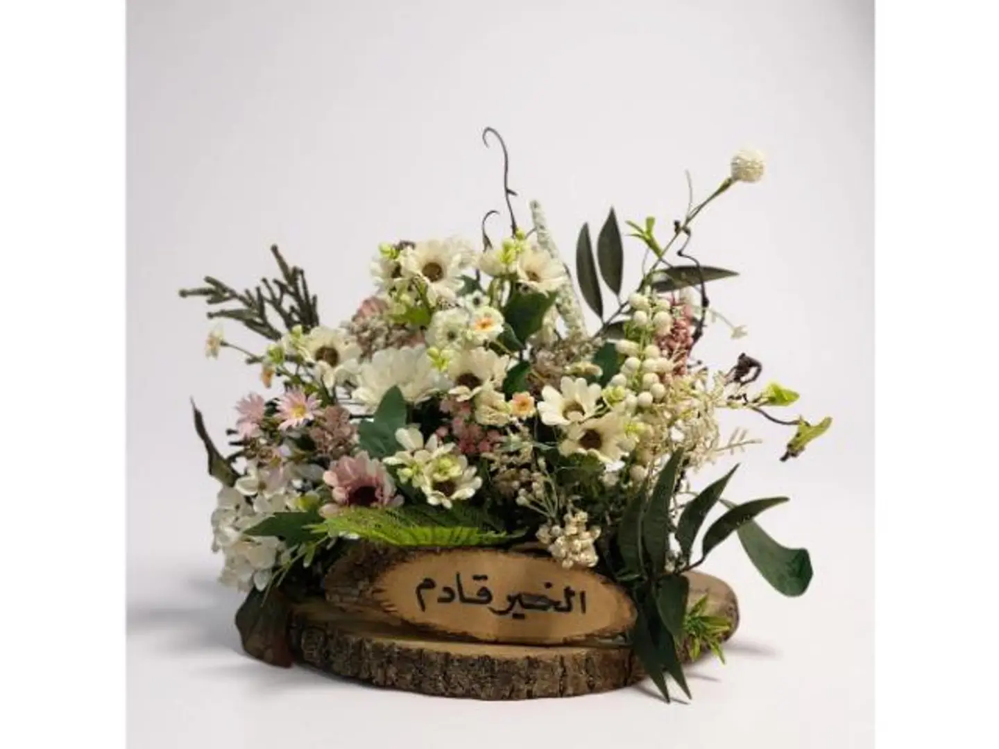 Artificial Flowers On Wooden Base
