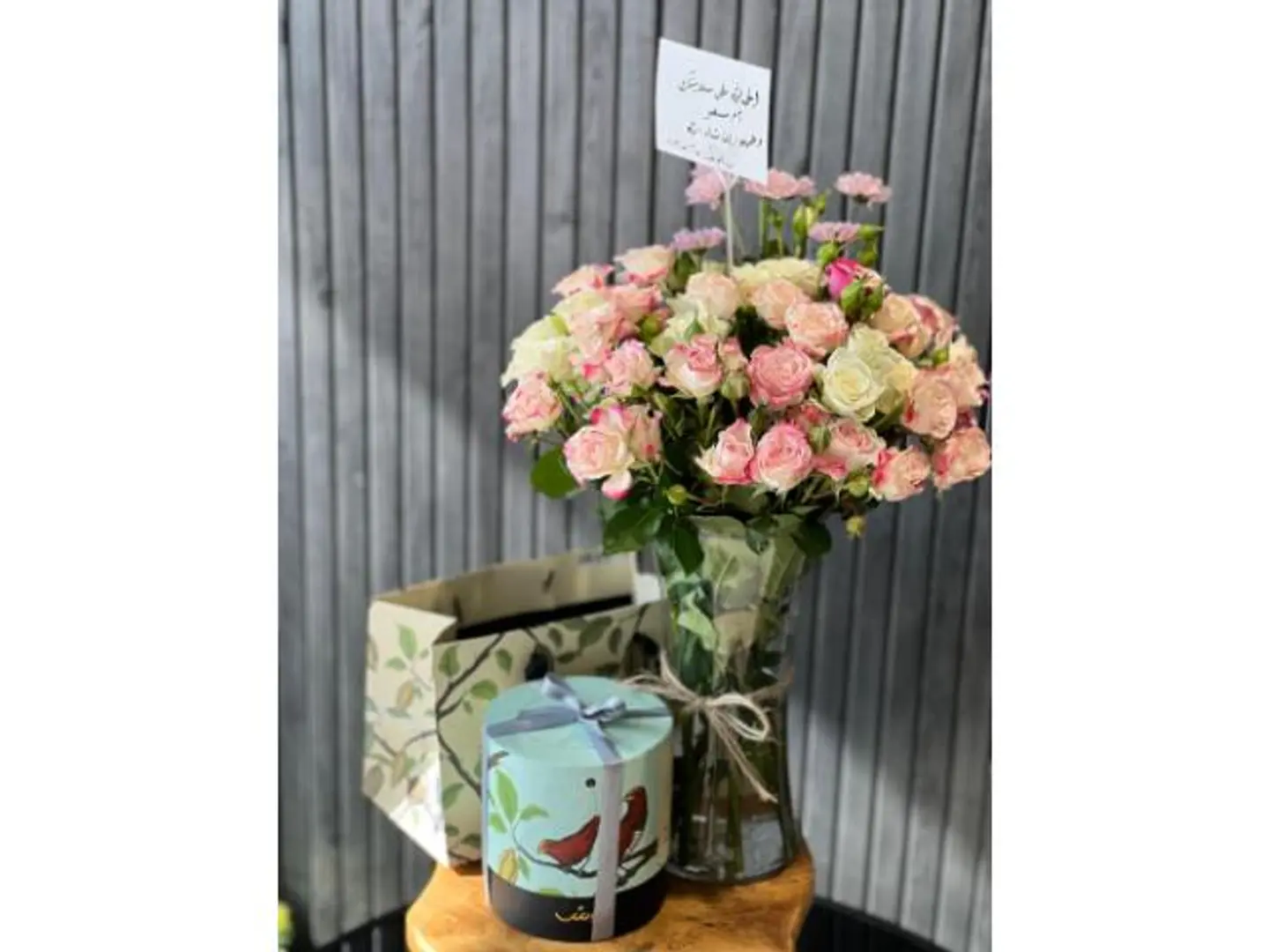 A Vase Of Roses With Anoush's Sweets