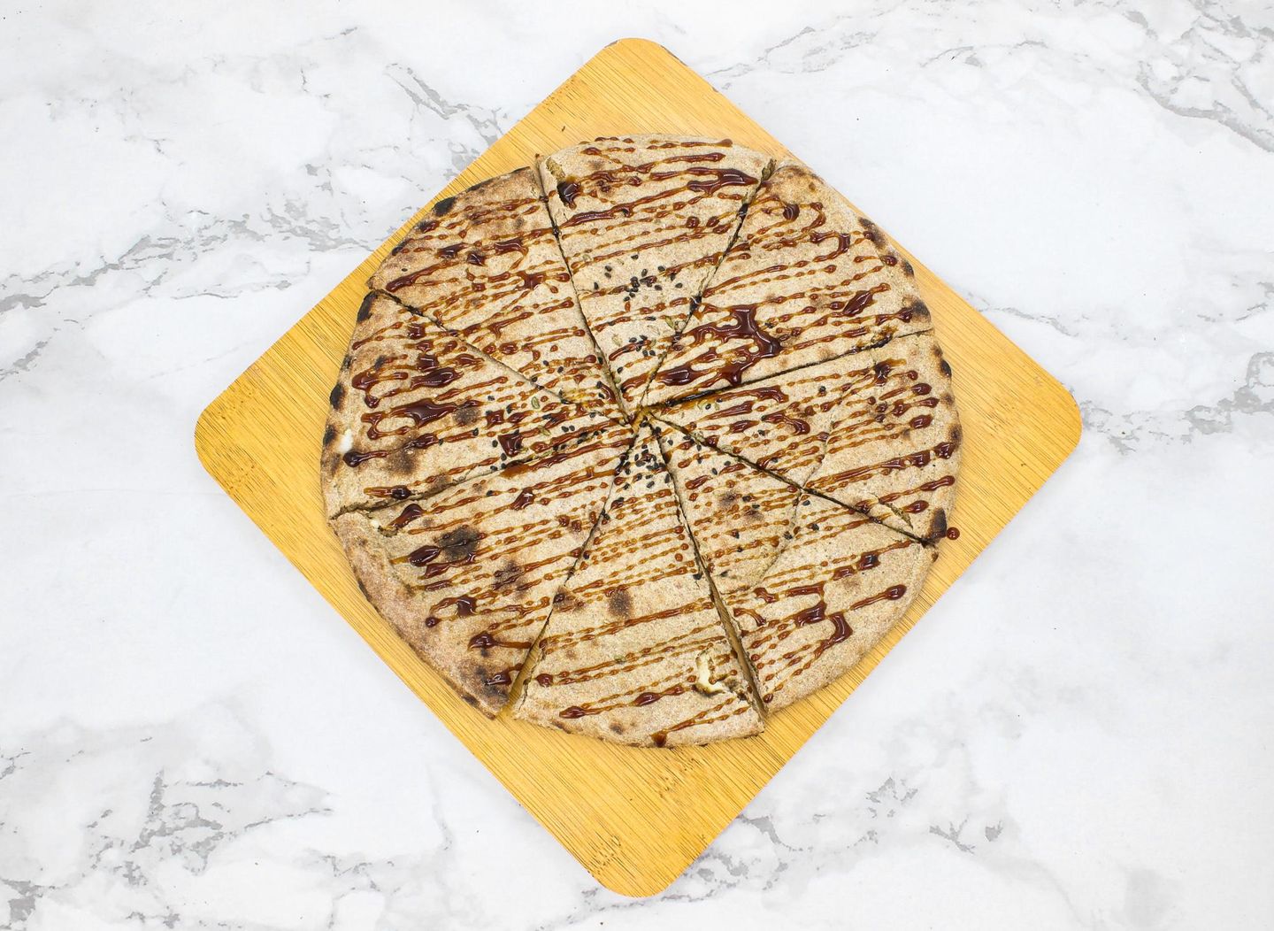 Round Hasawi Bread Stuffed With Triangular Cheese