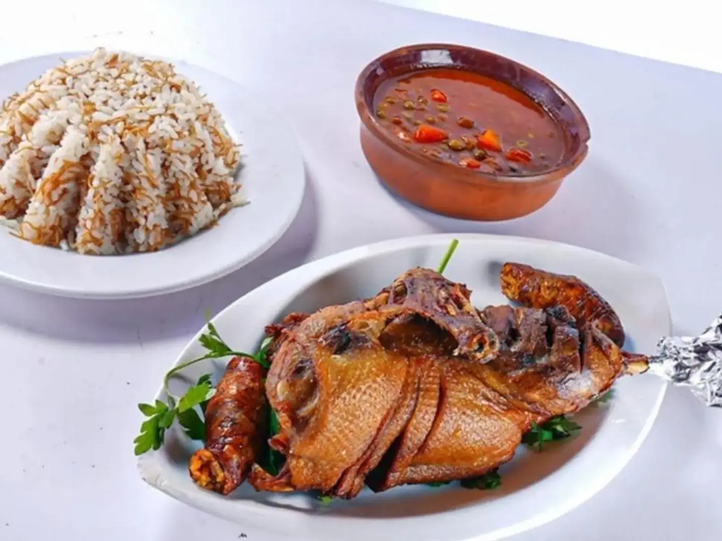 نص بطة مع أرز وخضار