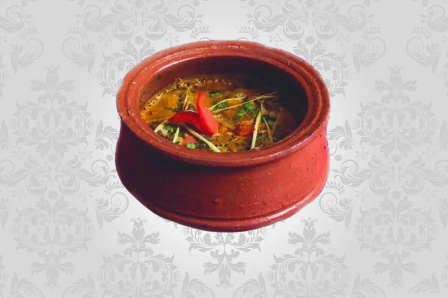 دجاج مطهو في وعاء فخاري