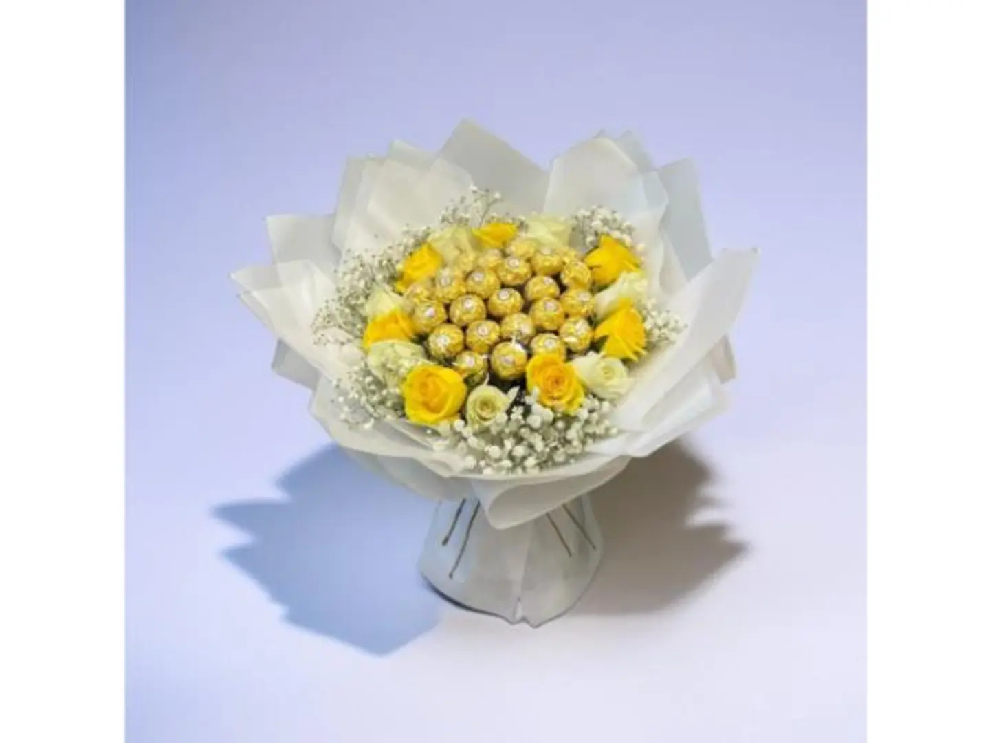 Bouquet Of Flowers And Chocolate With Elegant Wrapping