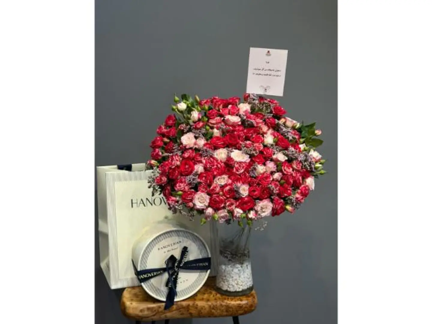 A Vase Of Roses And Belgian Henoverain