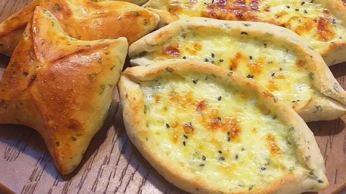 Pie With Eggs And Two Cheeses