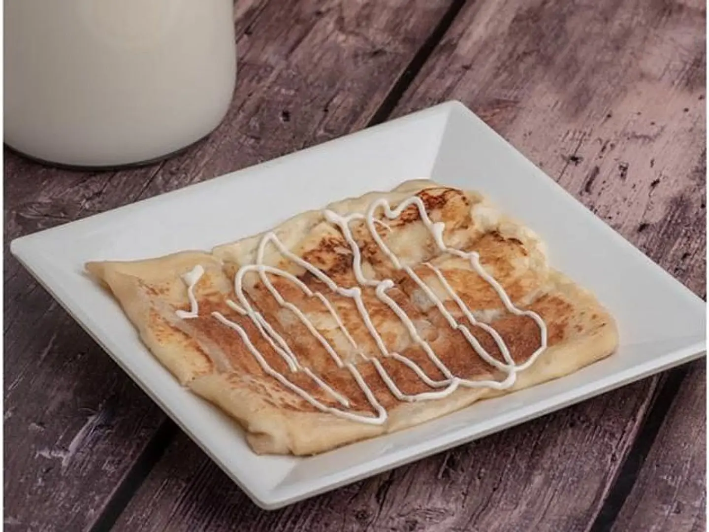 مطبق بالجبن سائل