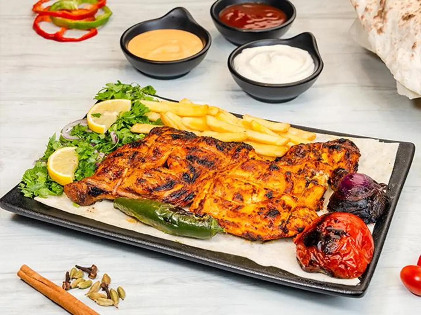 Half A Chicken On Charcoal With Potatoes