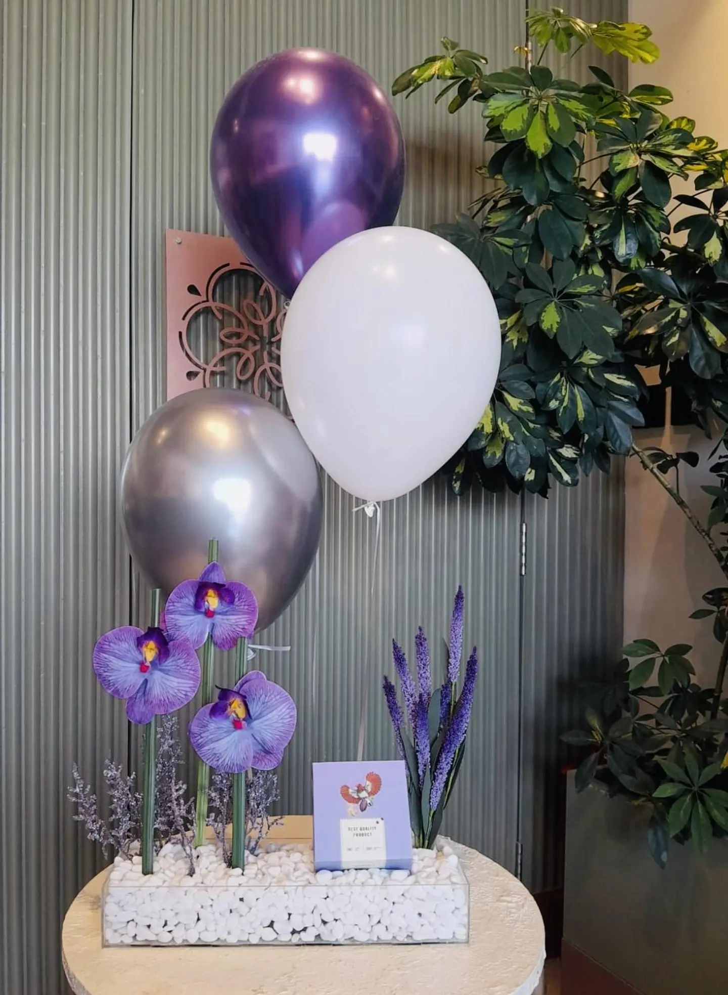 Chocolate With Artificial Flowers And A Balloon