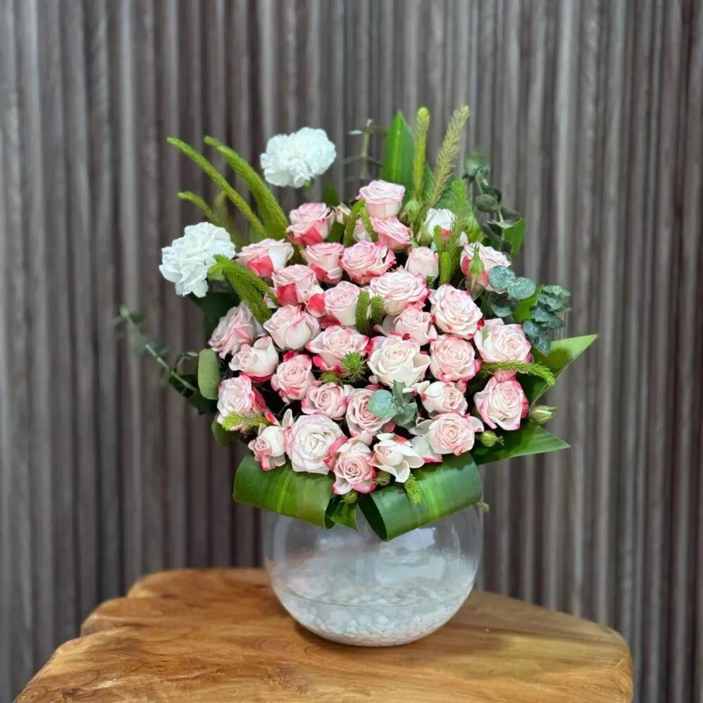 Pink Flower Arrangement In A Luxurious Glass Vase