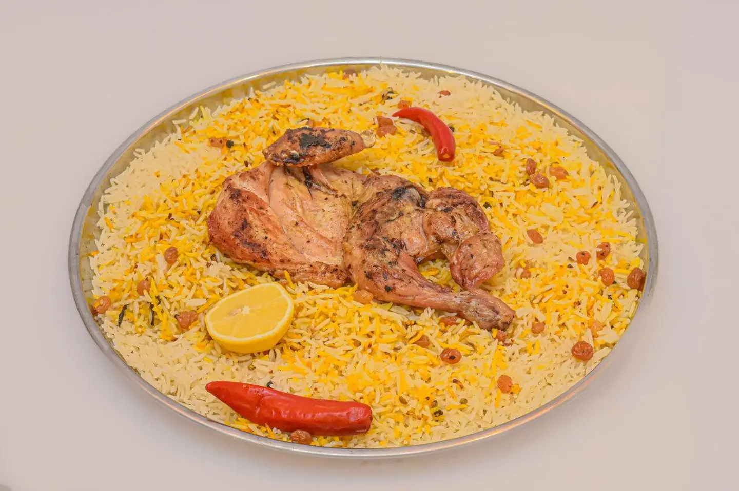 نصف دجاج مظبي مع ارز شعبي