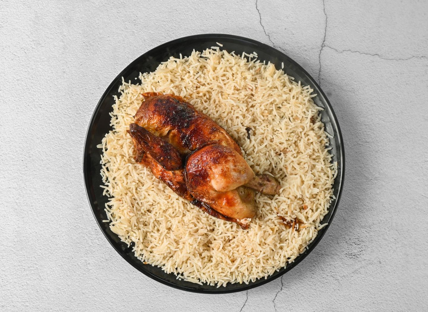 نصف دجاج شوايه مع أرز بيشاور