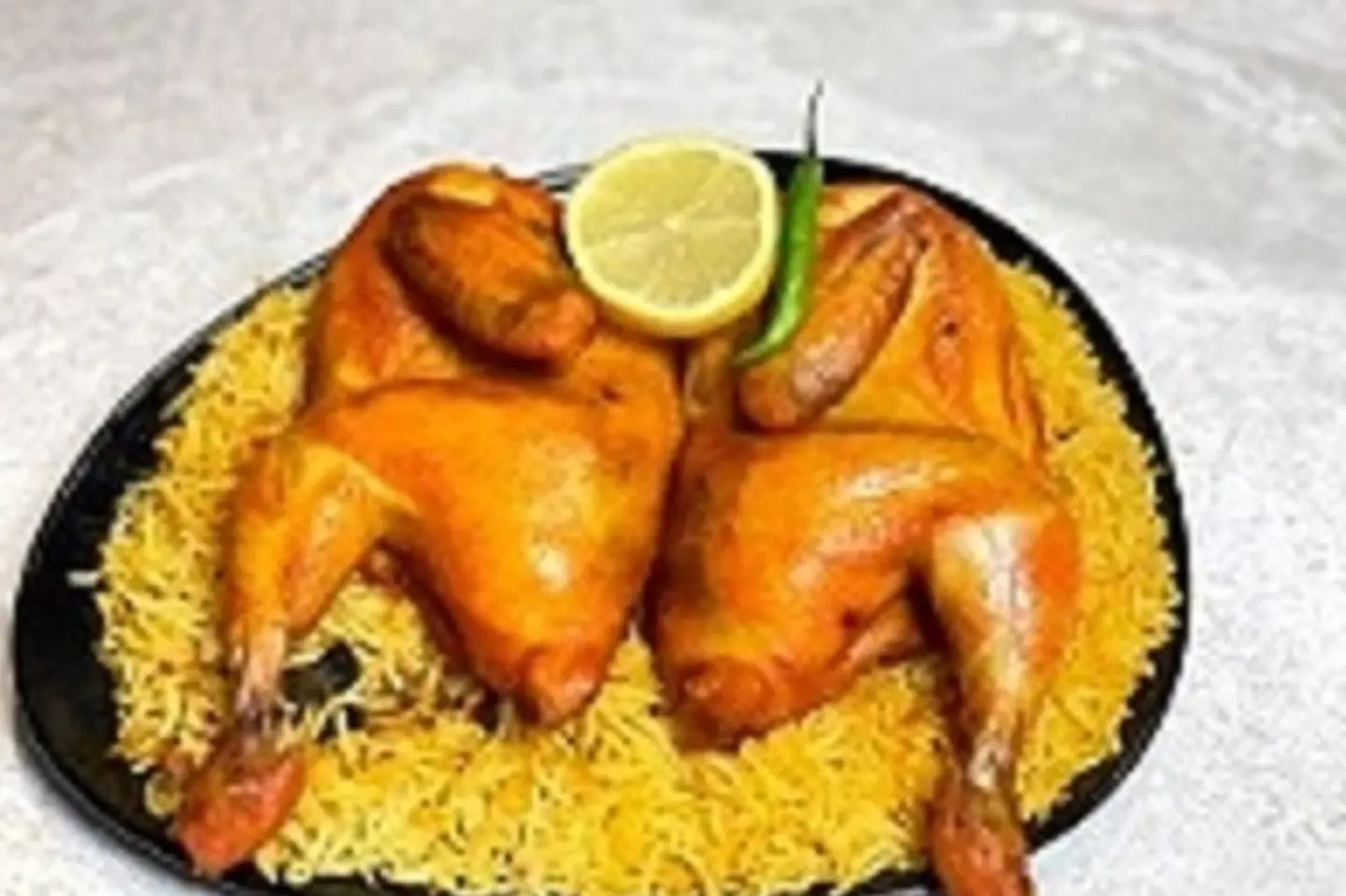 نص دجاج مندي مع رز مندي