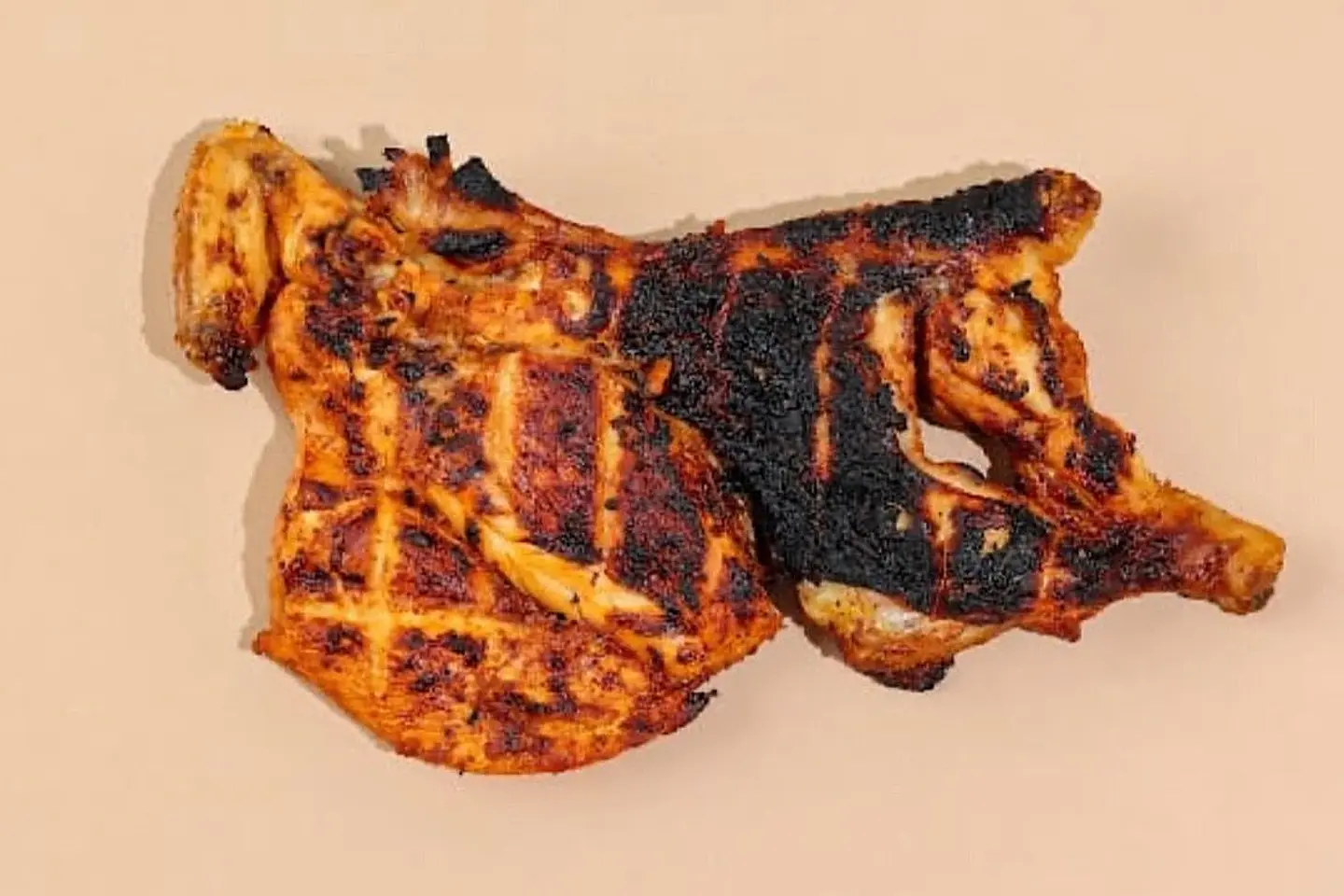 نص حبة دجاج على الفحم سادة