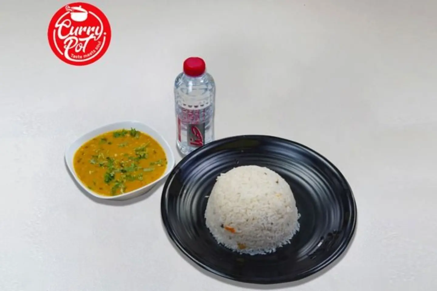 Ghee Rice Dhal Fry +Water