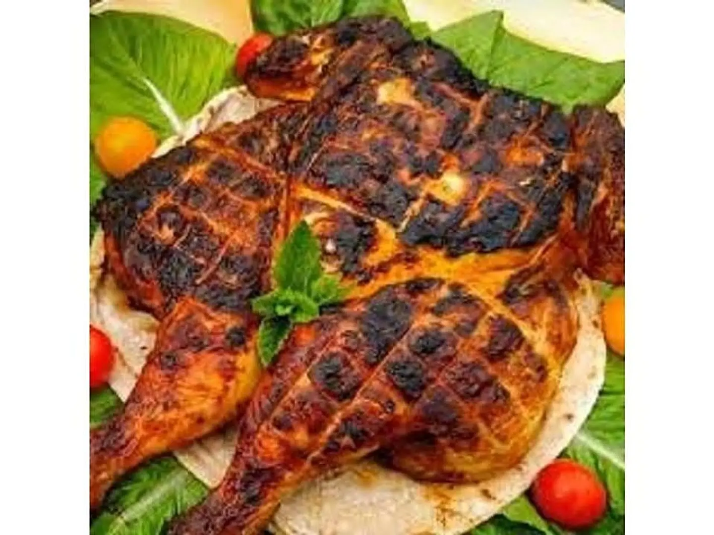 فروج كامل مشوي على الفحم