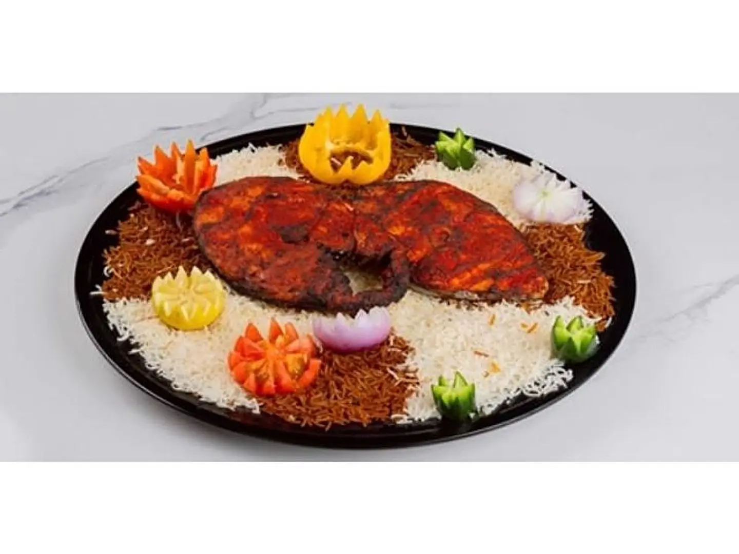 نصف كيلو سمك مع أرز