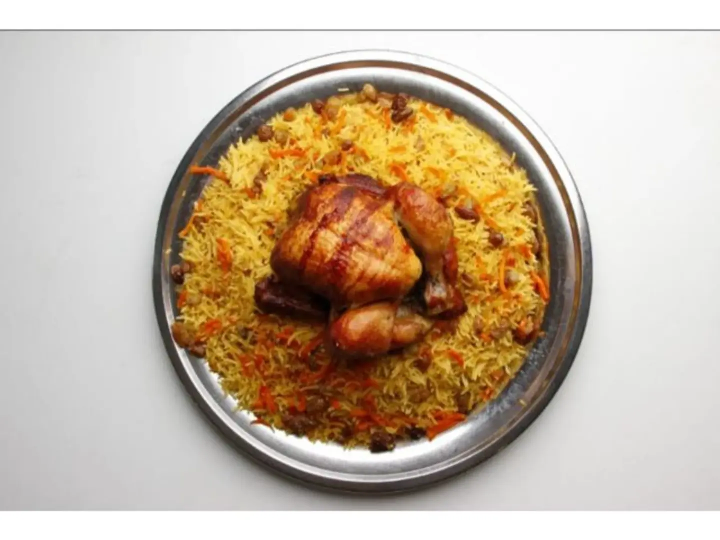 Half A Grilled Chicken With Rice