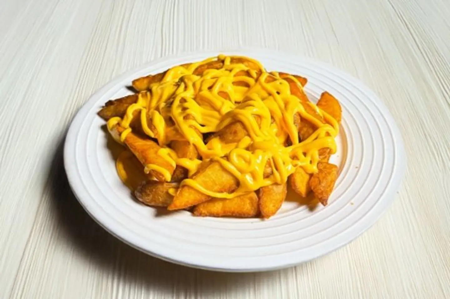 Wedges Fries Cheese Sauce