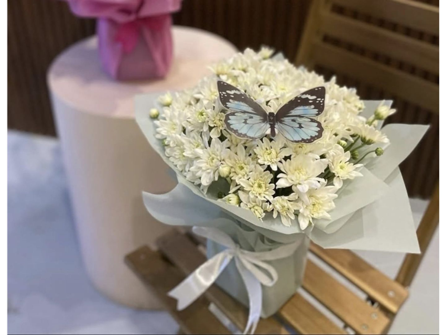 Special Occasion With Two Bouquets And Butterflies