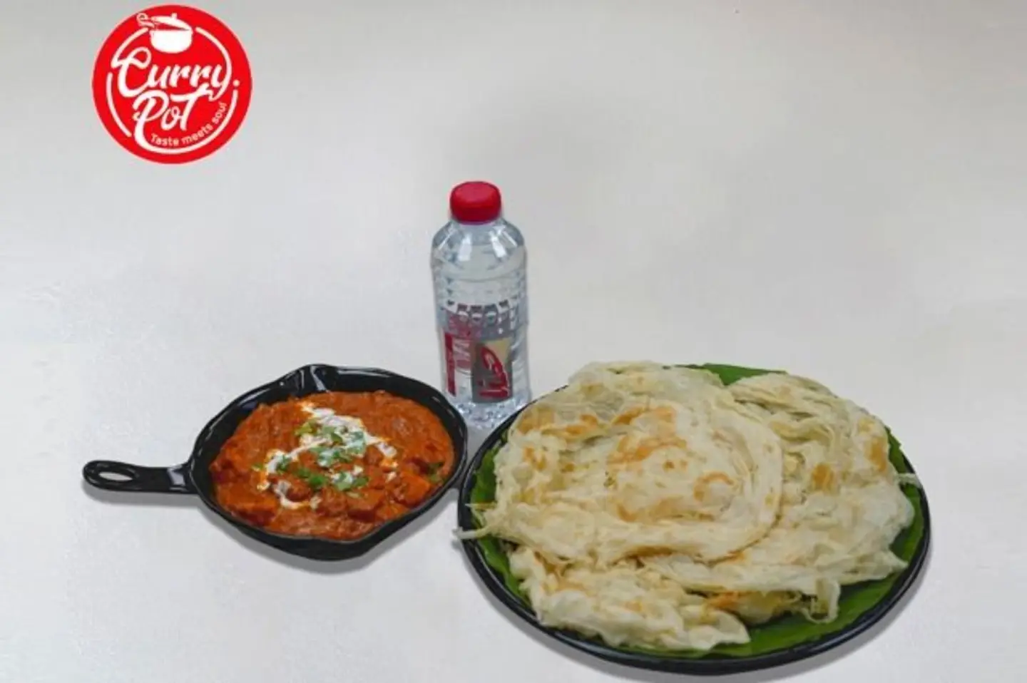 Porotta 3 Pcs + Paneer Butter +Water