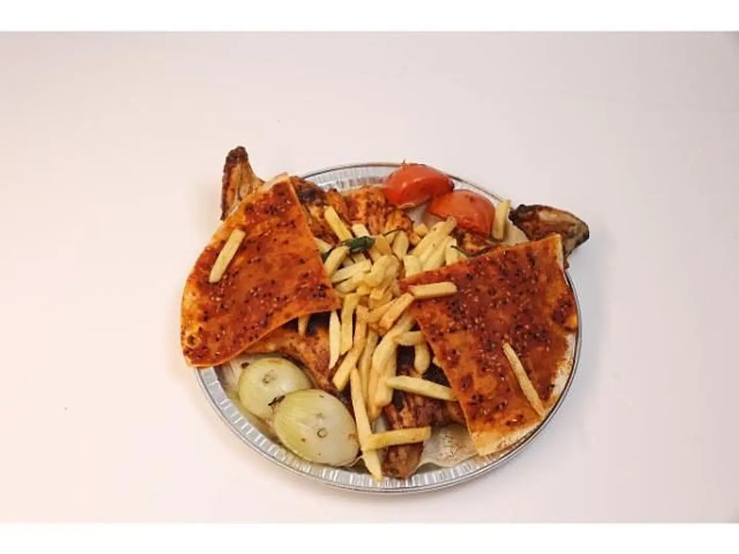 دجاجة على الفحم مع بطاطا