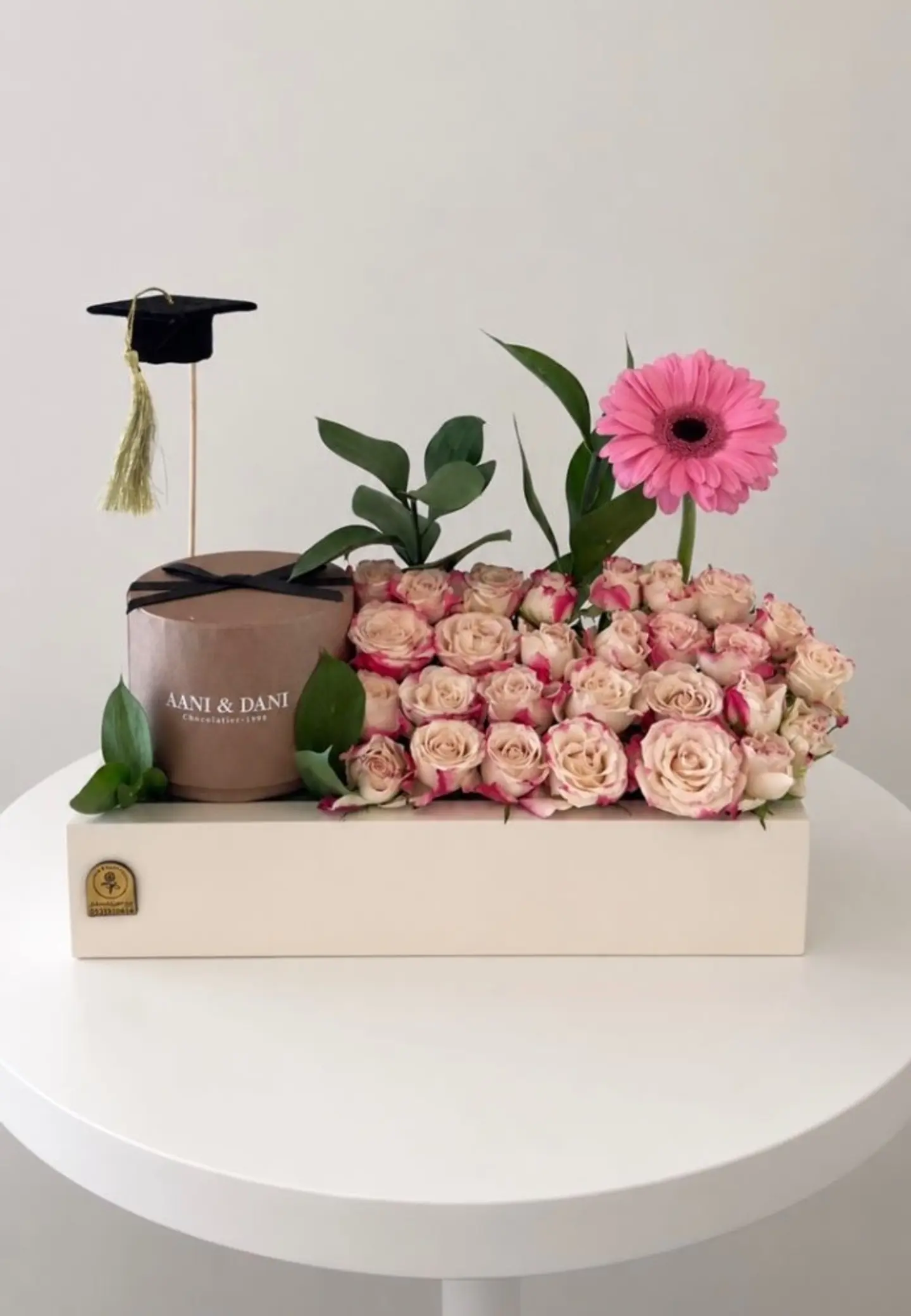 A Luxurious Graduation Gift: A Box Of Flowers And Chocolates