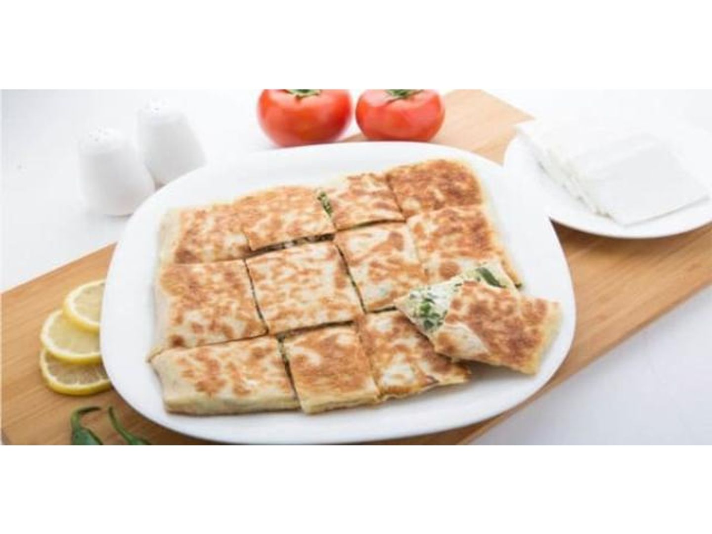Liquid Cheese Mutabbaq With Tomatoes