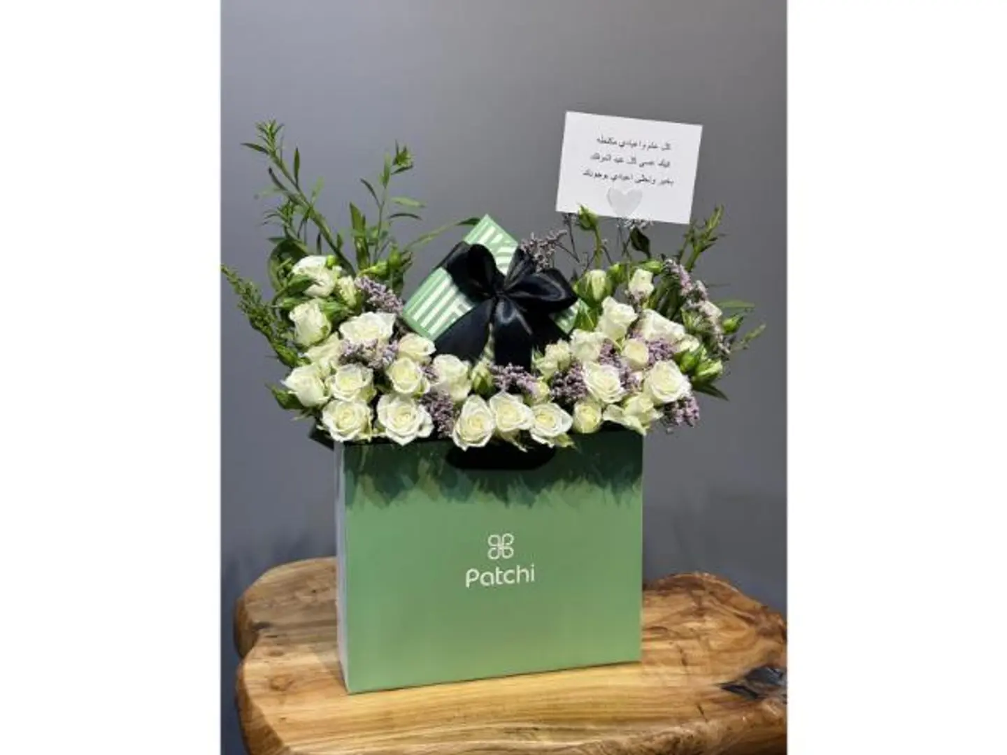 Patchi Chocolate And White Rose Arrangement