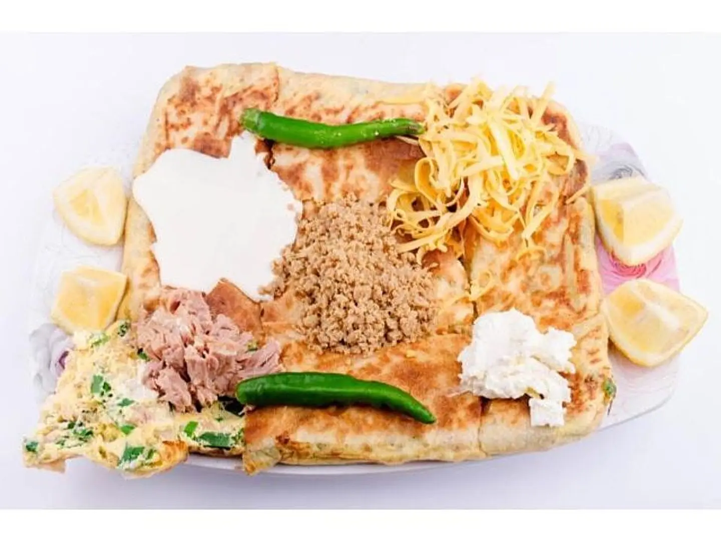 Mutabbak With Tuna And Two Cheeses