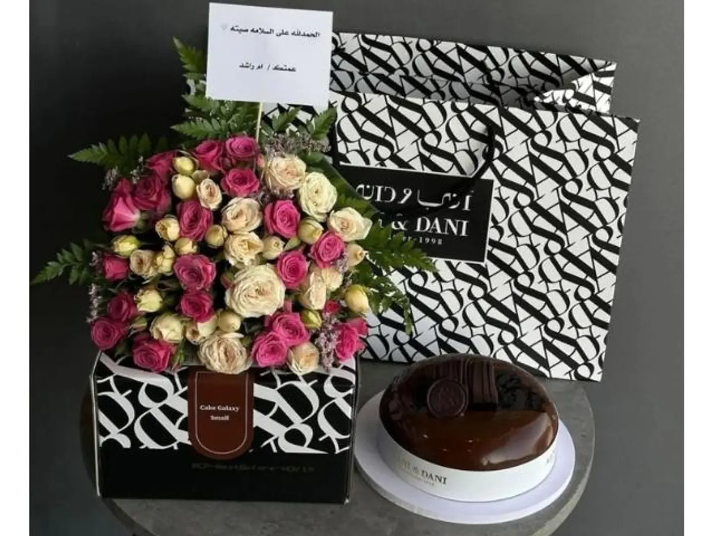 Elegant Flower Arrangement With Ani & Dani Cake