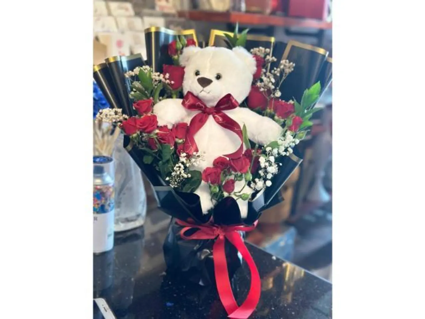 باقه الورد الأحمر مع دبدوب